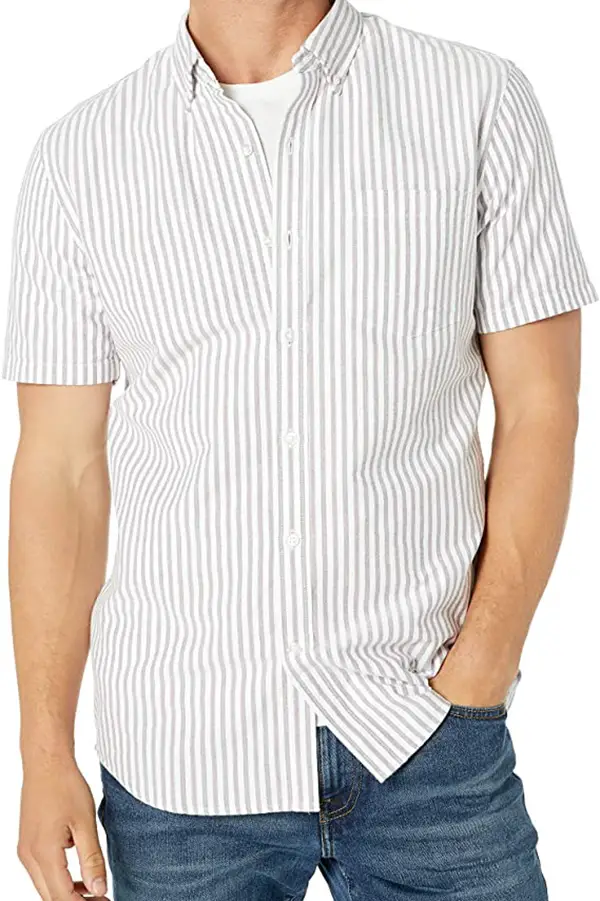 Close up of male model wearing striped button-down shirt.